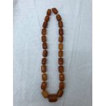 A large amber Baltic necklace: 168g