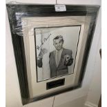 A framed & glazed signed photograph of George Burns with COA
