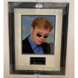 A framed & glazed signed photograph of David Caruso with COA