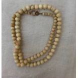 A white coral bead necklace