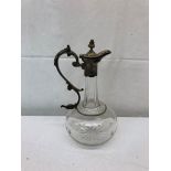An Edwardian silver-plated and glass decanter