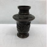 A Chinese bronze vase with a six-character mark to base