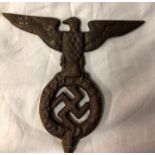 A cast metal Nazi flag top