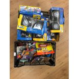 A box of blister pack cars;