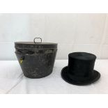 A cased top hat by W Macqueen & Co,