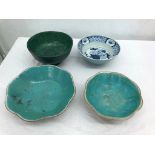 A green stoneware Chinese bowl;