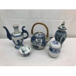 A quantity of Oriental blue and white ceramics to inc teapots,