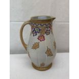 A Bursley Ware Charlotte Rhead jug with floral decoration,