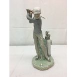 A Lladro figure of a golfer