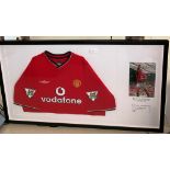 A Ruud van Nistelrouy hand-signed photograph mounted in a good quality frame;