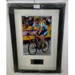A framed & glazed signed photograph of Lance Armstrong with COA