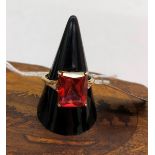 A 9ct gold diamond & red stone ring