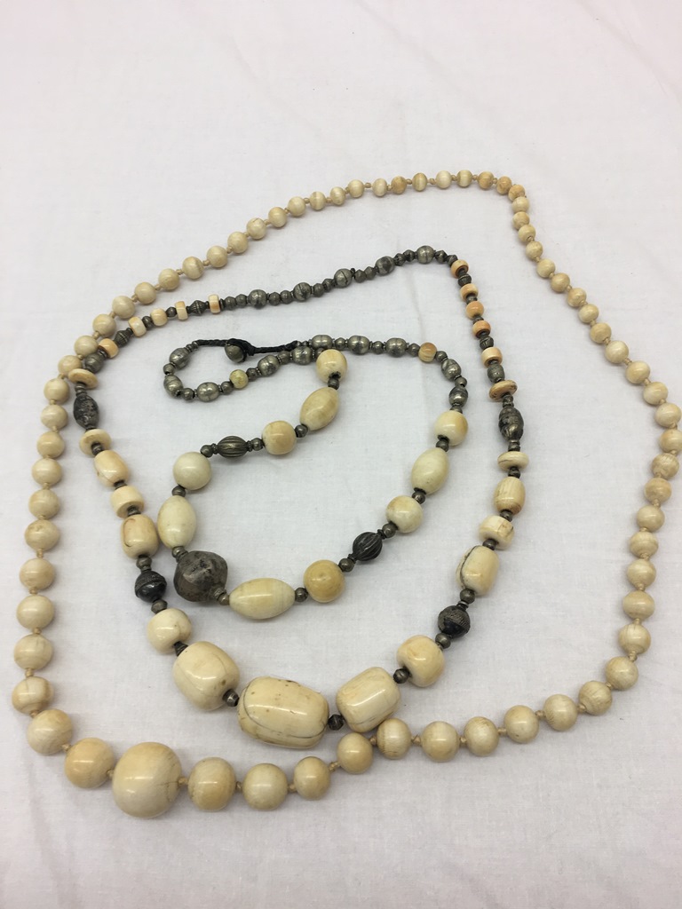 Three 19th century ivory necklaces