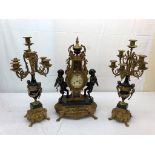 A French Empire-style clock garniture