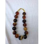 A large amber beaded necklace: half kilo