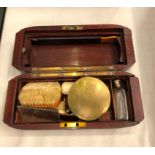 A Victorian vanity set in a wooden box;