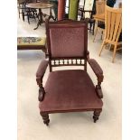 An Edwardian mahogany easy chair