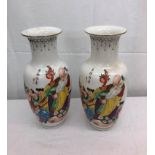 A pair of modern Chinese vases depicting a grandfather and children