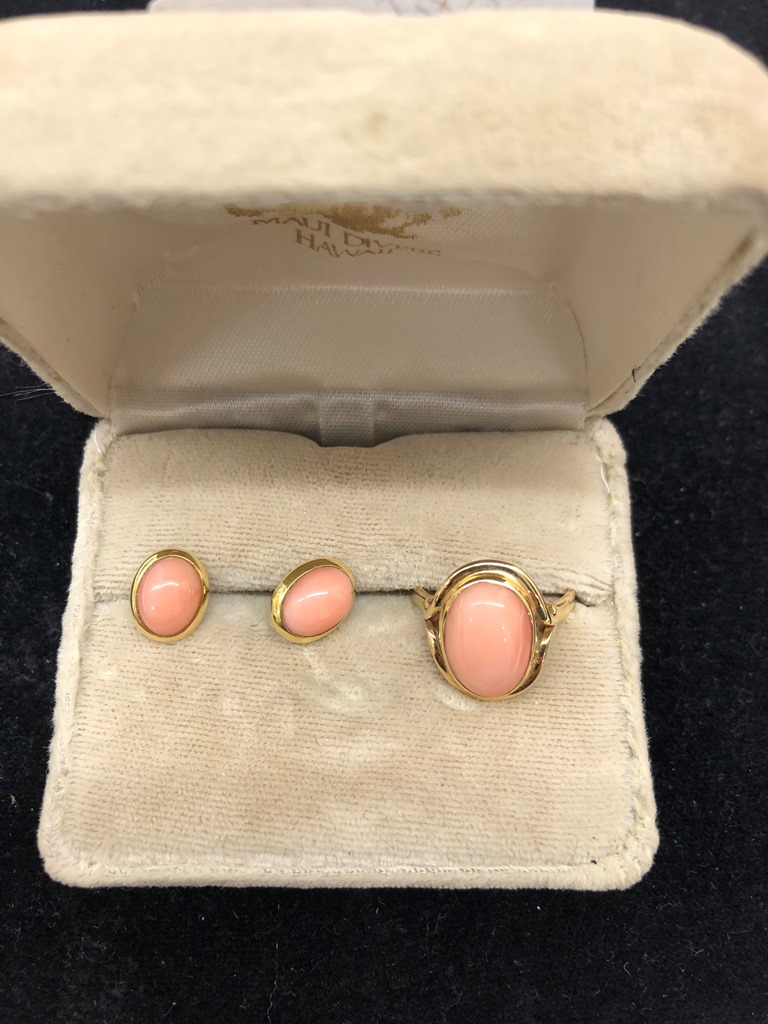 A set of coral earrings and rings