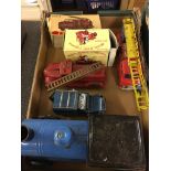 A box of tinplate to inc a Tri-ang express train,