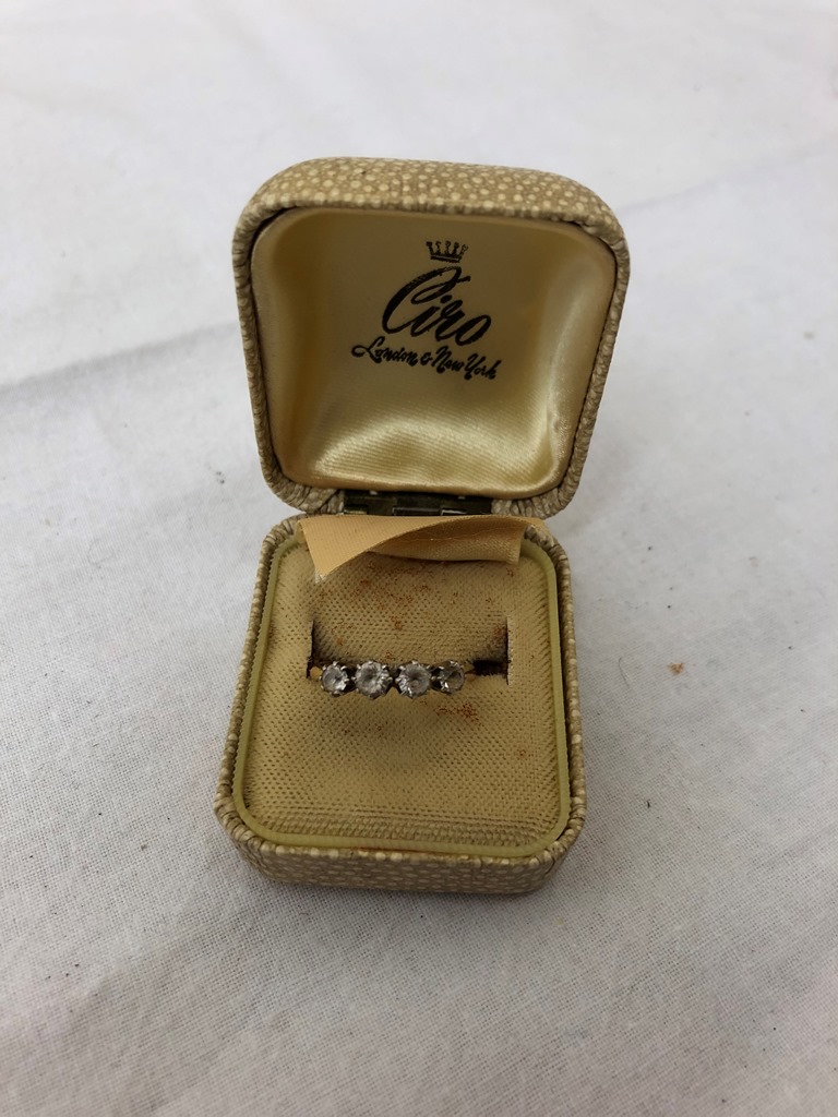 A four-stone gold ring