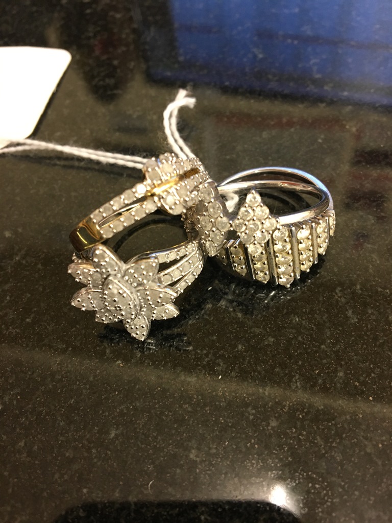 Four diamond set dress rings