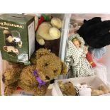 Two boxes of teddy bears and dolls