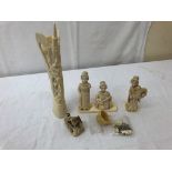 A quantity of ivory figures