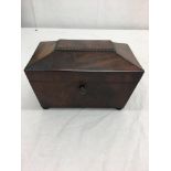 A Victorian mahogany tea caddy