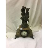 A Victorian onyx mantle clock
