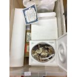 A box of Alsation collectors' plates;
