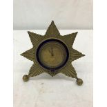 A 19th century military-style travel clock