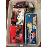 A box of toys to inc a boxed battery-operated police car,