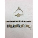 A silver Turkish bracelet;