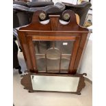 An Edwardian wall hanging corner cabinet;