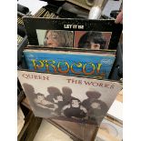 A box of LPs to inc Manfred Mann, Queen, Swinging Blue Jeans, Eddie Cochran, Squeeze, Thin Lizzy,