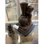 A 19th century bronze figure of putti lifting a jug marked to base F Barbedienne together with a