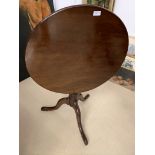 A 19th century mahogany tilt-top table