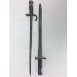 A Gras bayonet and saw backed