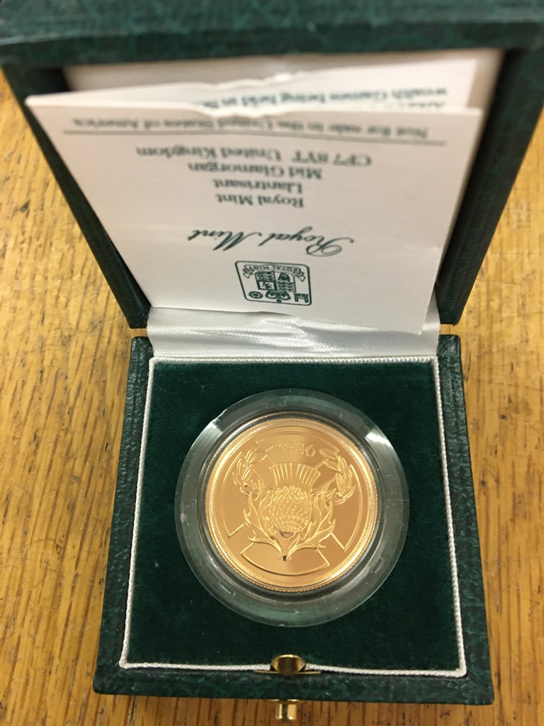 A 1986 gold proof £2 coin