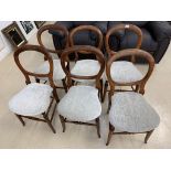 A set of six Victorian balloon-back chairs