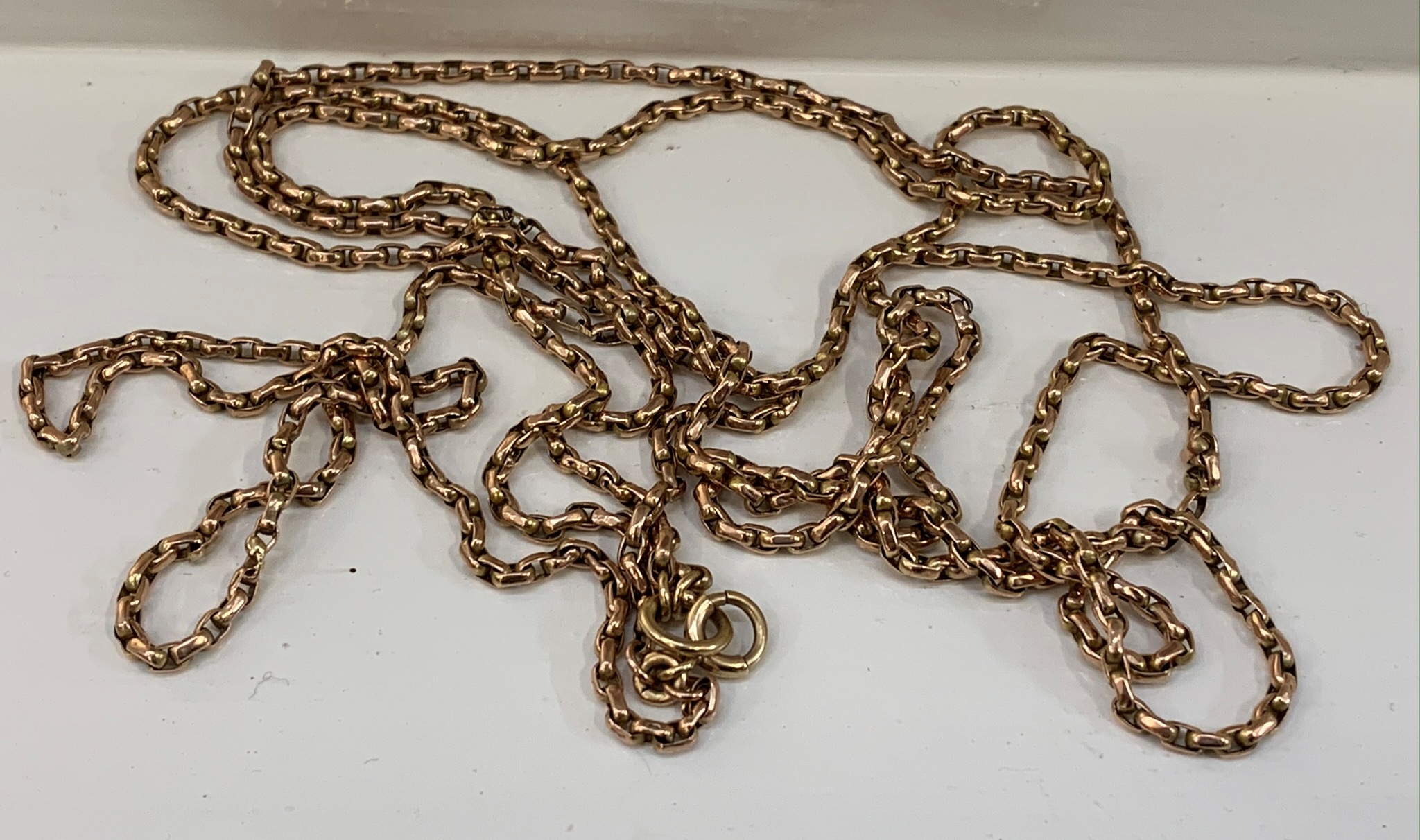 A 9ct gold longguard chain