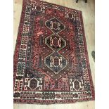 A woollen Persian rug