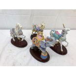 Four Brooks and Bentley ceramic carousel horses