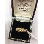 An 18ct 5-stone diamond dress ring
