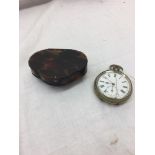 A tortoiseshell snuff box and pocket watch