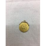 A gold 1 1/3 Guinea (1802)
