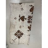 An animal hide rug (possibly Native American) decorated with trible spade decoration: 163cm x 122cm