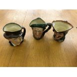 Three Doulton toby/character jugs