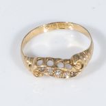 An 18ct gold ring set with diamonds, size P